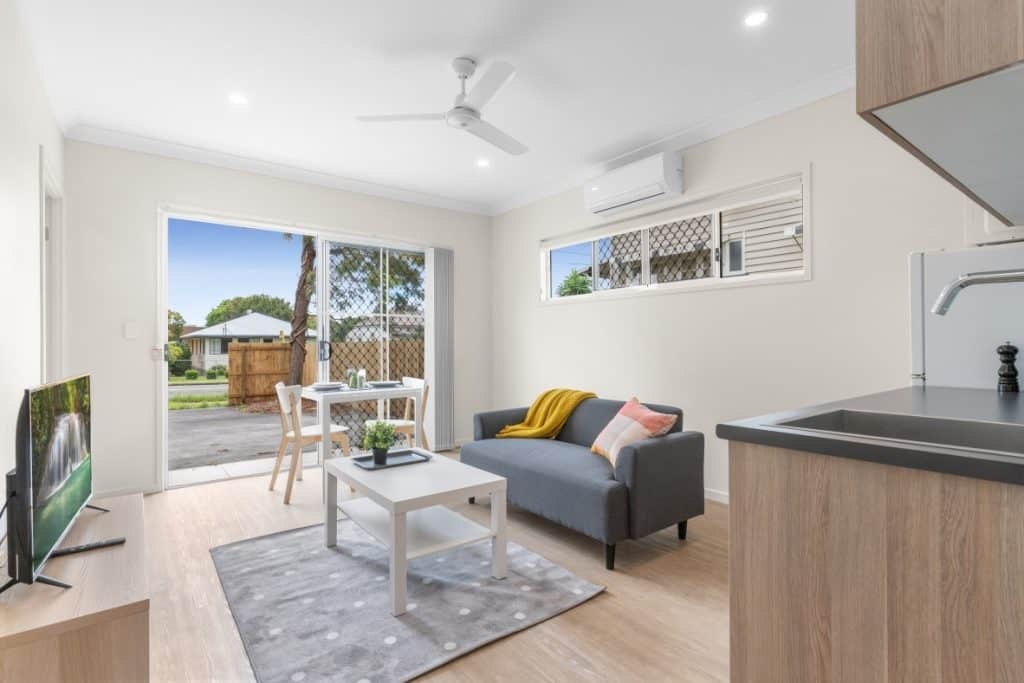 Furnished bedroom interior in a Brisbane rooming house